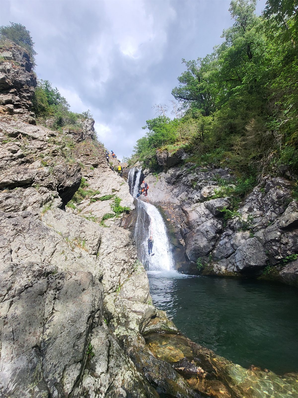 Natural waterfall slide in the Bramabiau canyon, a playful beginner route below Mont Aigoual in the Cévennes
